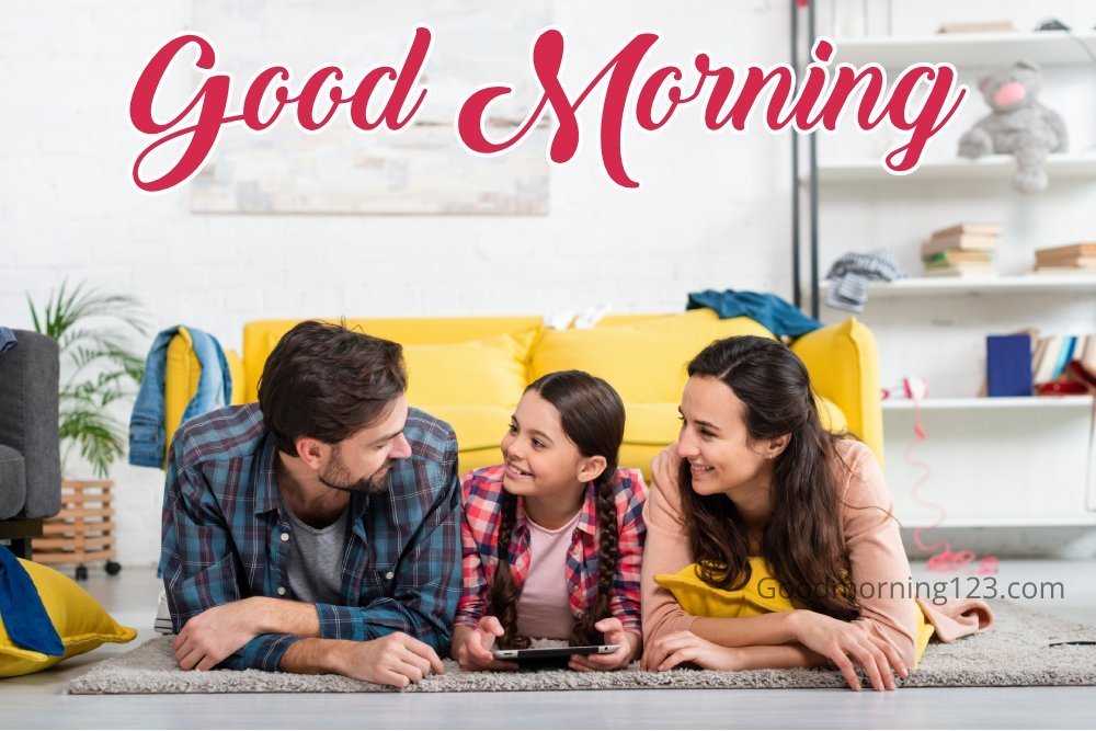 A Family Sharing A Warm Moment, Promoting Connection Through A Good Morning Greeting.